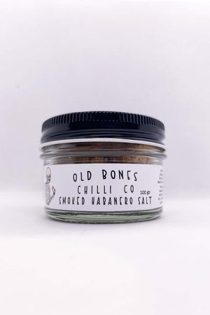 Smoked Habanero Salt 100g in a glass jar from Old Bones Chilli Co, perfect for gourmet spicy dishes.